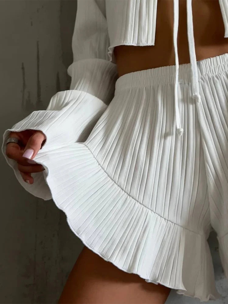 Conjunto de muselina con volantes y lazado