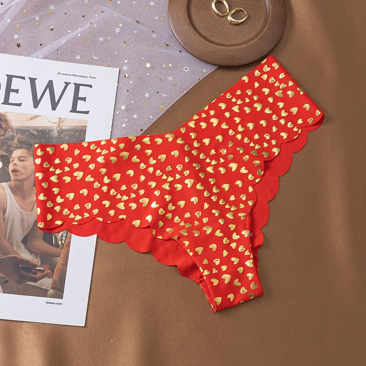 Braguita con borde de volantes y estampado brillante