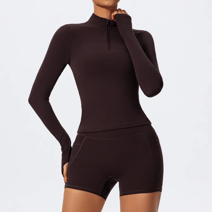 Traje deportivo con manga larga y cremallera