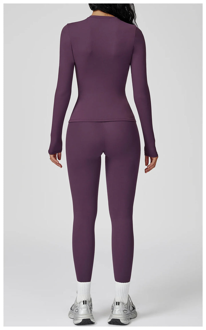 Traje deportivo con leggings y manga larga