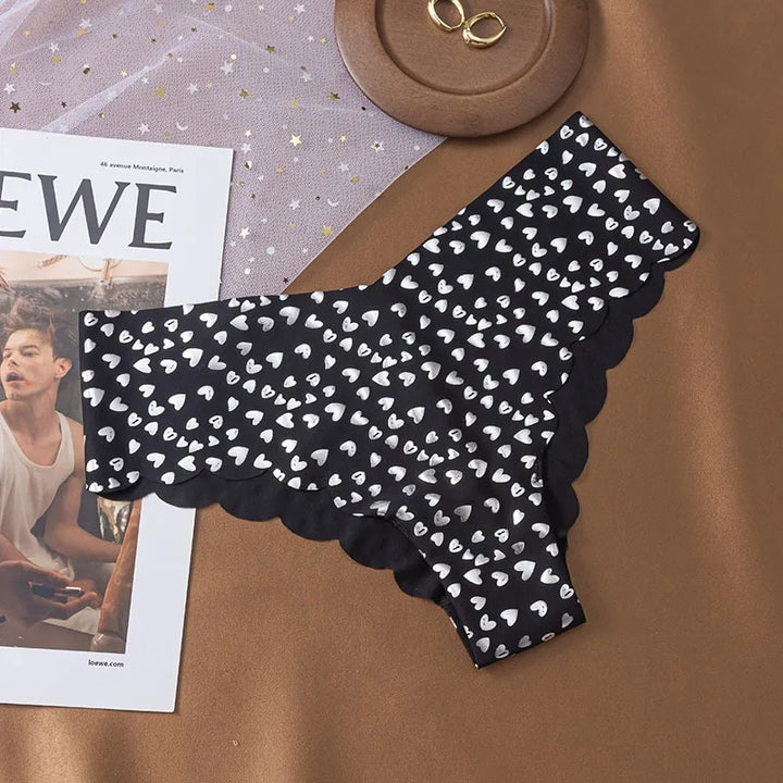 Braguita con borde de volantes y estampado brillante