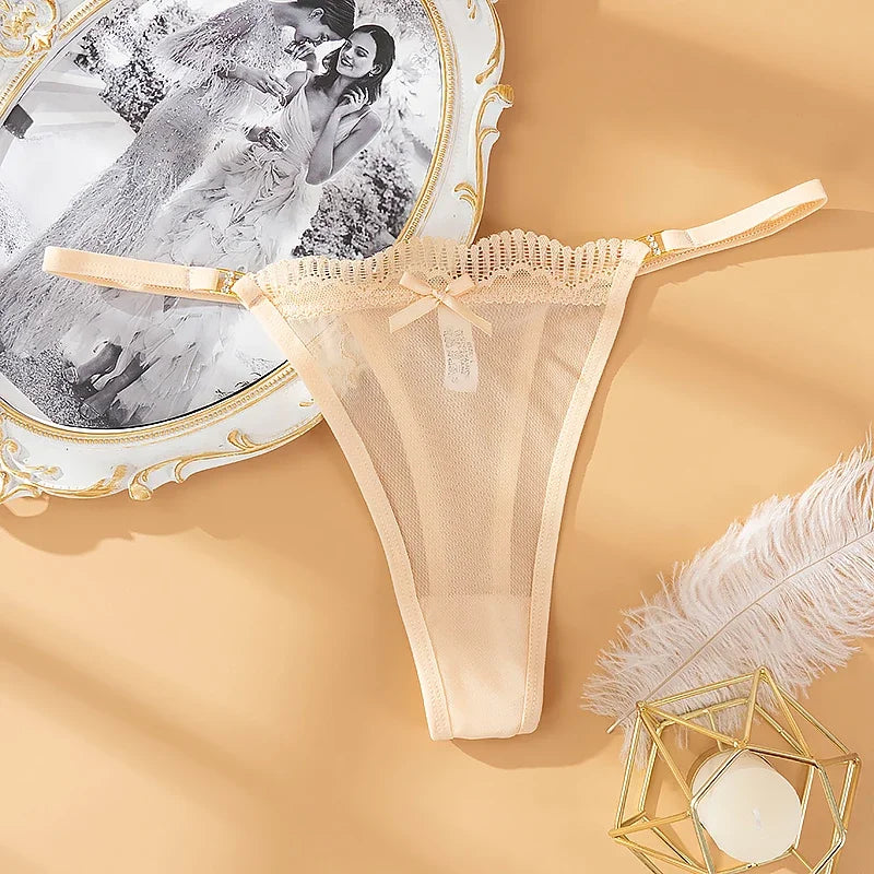 Tanga de malla semitransparente con lacito