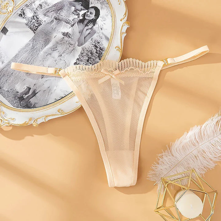 Tanga de malla semitransparente con lacito