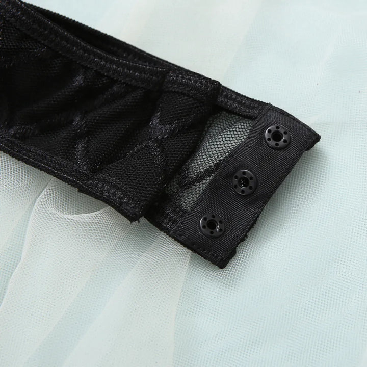 Body con diseño a cuadros y cadenas