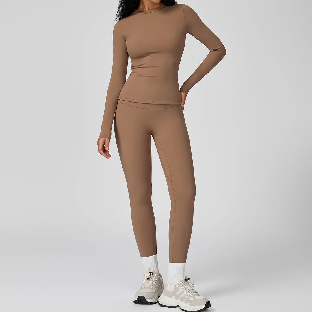 Traje deportivo con leggings y manga larga