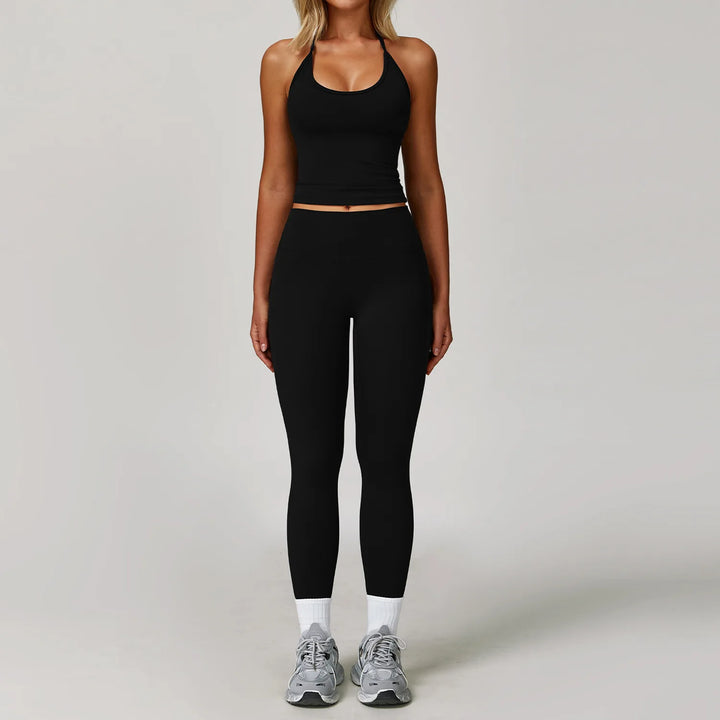 Conjunto deportivo con leggings y lazado en cuello