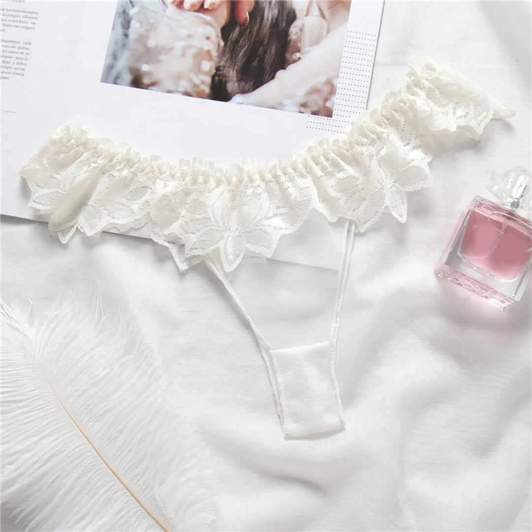 Tanga de malla con ribete de encaje