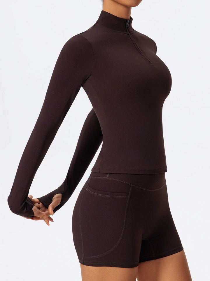 Traje deportivo con manga larga y cremallera