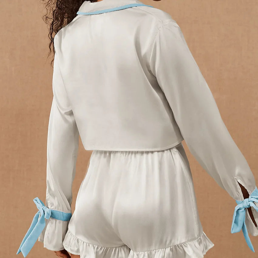 Pijama corto con lazos y volantes