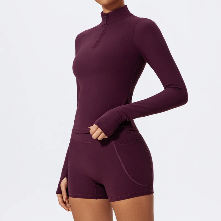 Traje deportivo con manga larga y cremallera