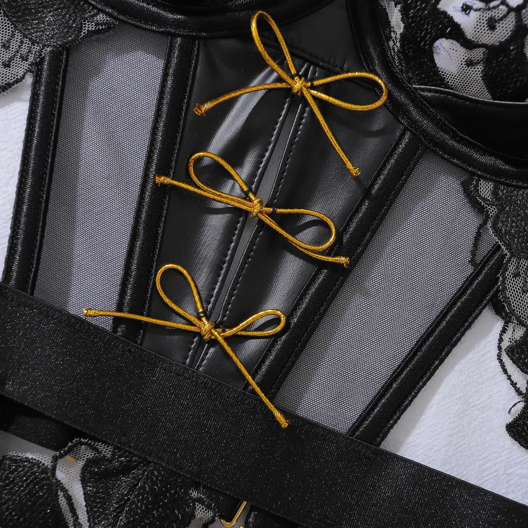 Body de encaje con bordado y lacitos dorados