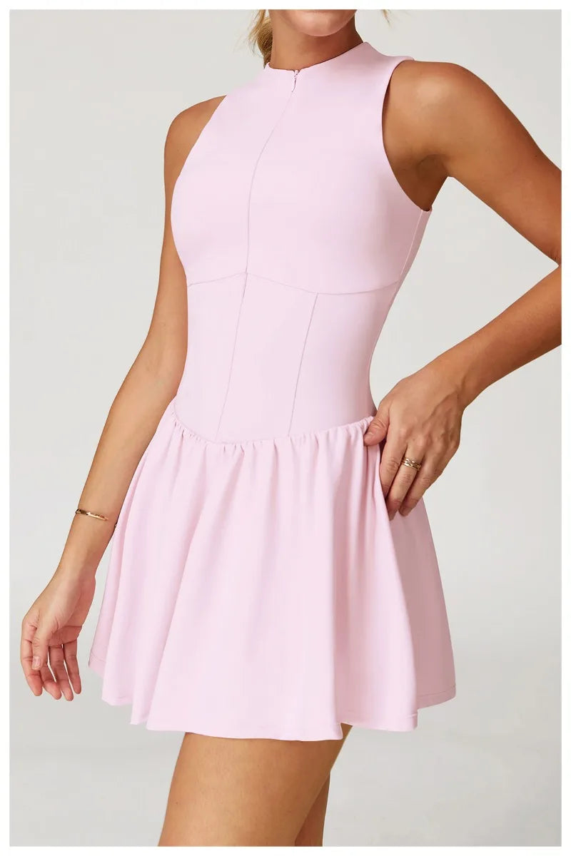 Vestido deportivo con cremallera y pantalones escondidos