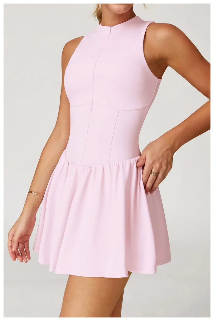 Vestido deportivo con cremallera y pantalones escondidos