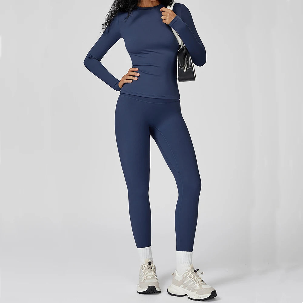 Traje deportivo con leggings y manga larga