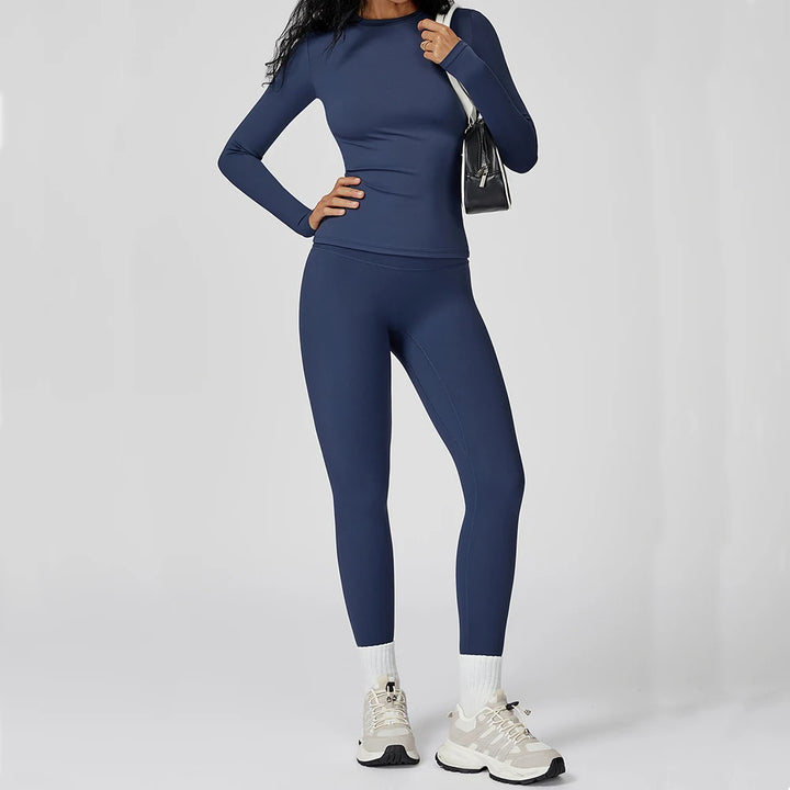 Traje deportivo con leggings y manga larga