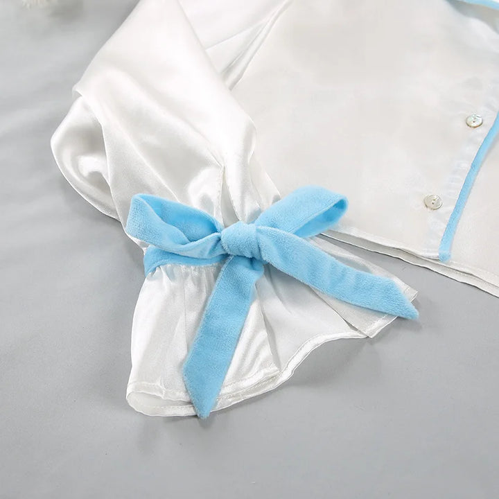 Pijama corto con lazos y volantes