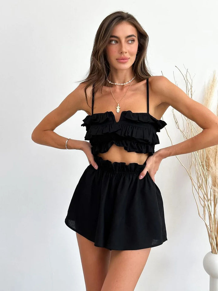 Conjunto negro con top de volantes